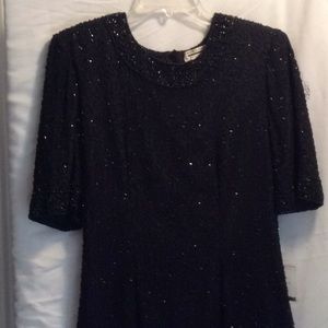 Beaded black cocktail dress never worn